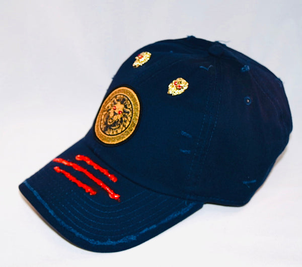 Signature Ruby Eye Lion-Emblem Medallion French Navy Bleu Cap