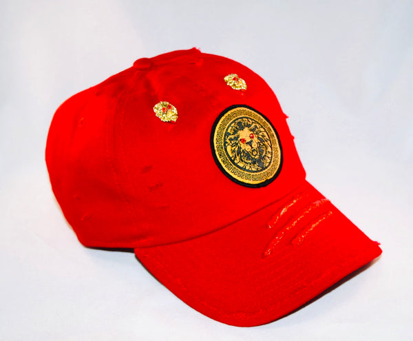 Signature Ruby Eye Lion-Emblem Medallion Red Cap