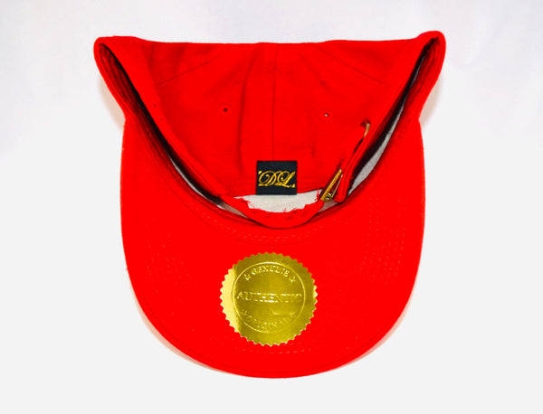 Signature Ruby Eye Lion-Emblem Medallion Red Cap