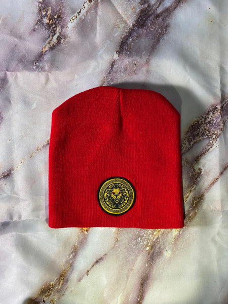 Signature Ruby Eye Lion-Emblem Medallion Fire Red Beanie