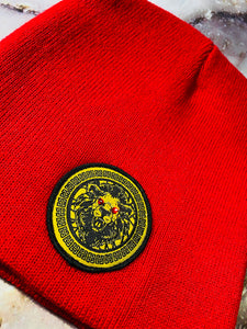 Signature Ruby Eye Lion-Emblem Medallion Fire Red Beanie