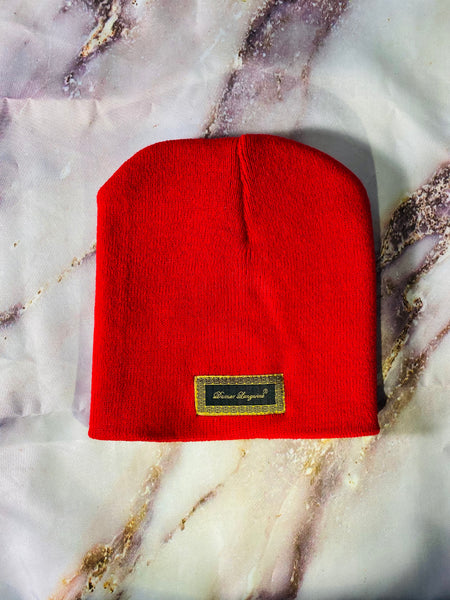 Signature Ruby Eye Lion-Emblem Medallion Fire Red Beanie