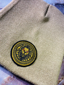 Signature Ruby Eye Lion-Emblem Medallion Desert Tan Beanie