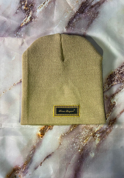 Signature Ruby Eye Lion-Emblem Medallion Desert Tan Beanie