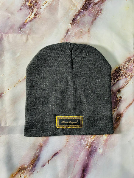 Signature Ruby Eye Lion-Emblem Medallion Heather Grey Beanie