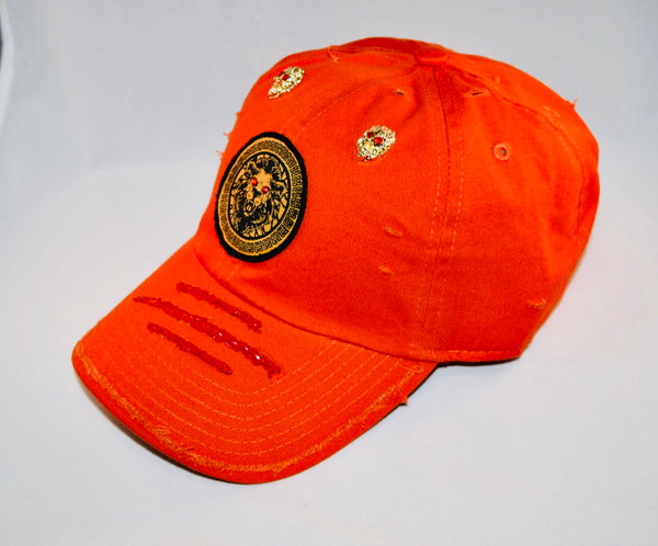 Signature Ruby Eye Lion-Emblem Medallion Orange Cap