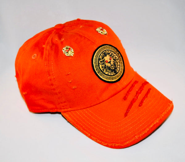 Signature Ruby Eye Lion-Emblem Medallion Orange Cap