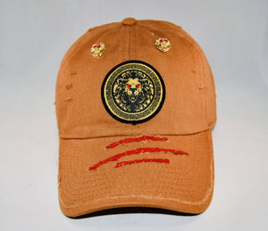 Signature Ruby Eye Lion-Emblem Medallion Tan Cap