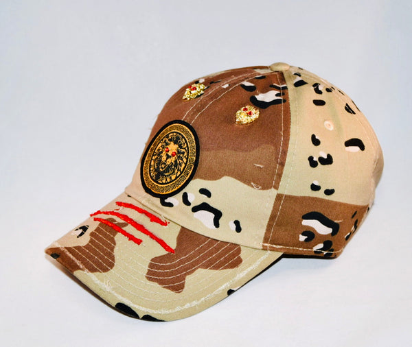 Signature Ruby Eye Lion-Emblem Medallion Desert Camo Cap